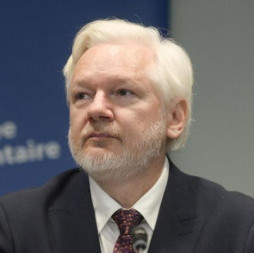 Assange accuses CIA of transnational repression...