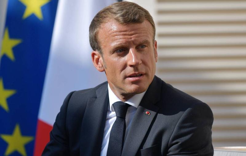 Macron calls for reviewing ties with Russia